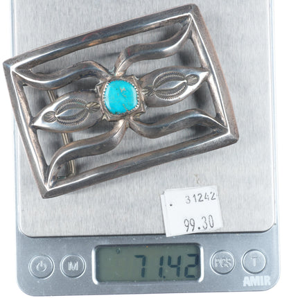 Vintage Navajo sterling cast silver belt buckle stamped center with turquoise