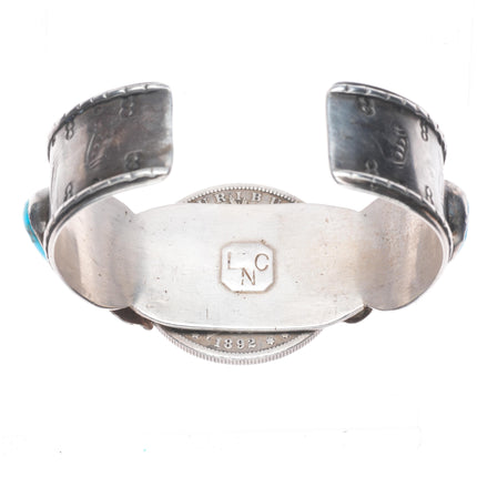 7" Vintage Navajo sterling silver cuff bracelet with turquoise dollar coin