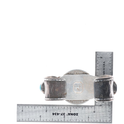 7" Vintage Navajo sterling silver cuff bracelet with turquoise dollar coin