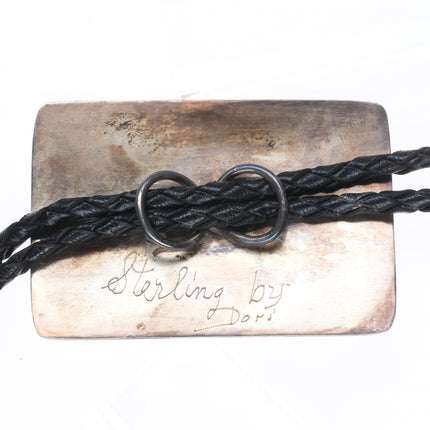 Retro Southwestern sterling silver golfing Kokopelli bolo tie