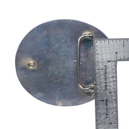 Vintage Navajo sterling cast silver belt buckle stamped center with turquoise