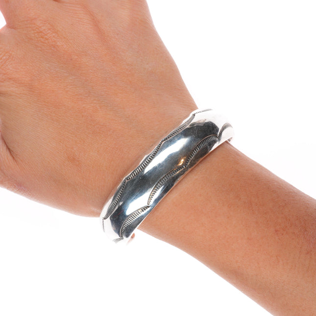 6.75" Orville Tsinnie Navajo sterling silver stamped domed cuff bracelet
