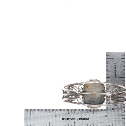 6.5" Miriam Chuyate - Hopi-Tewa twisted sterling silver turquoise cuff bracelet