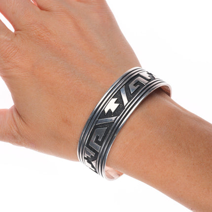 6.75" Tommy Singer Navajo sterling silver geometric rug pattern cuff bracelet