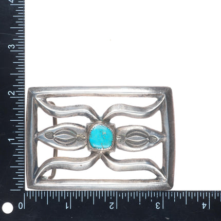 Vintage Navajo sterling cast silver belt buckle stamped center with turquoise