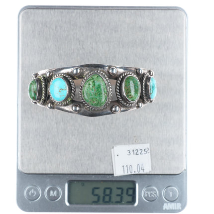 7" Vintage Navajo sterling silver turquoise graduated row cuff bracelet