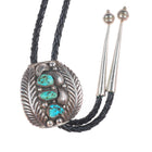 Vintage Navajo sterling silver and turquoise feather edge bolo tie