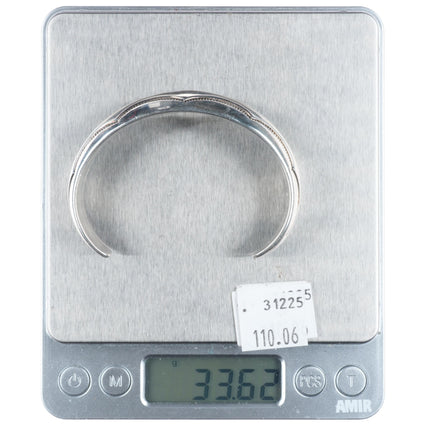 6.75" Orville Tsinnie Navajo sterling silver stamped domed cuff bracelet