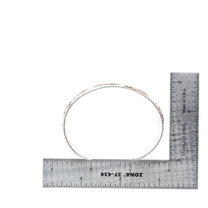 6.6" Richard L. Reeve Apache Native American sterling storyteller cuff bracelet