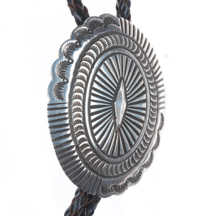 Big vintage Navajo sterling silver deep stamped concho style bolo tie