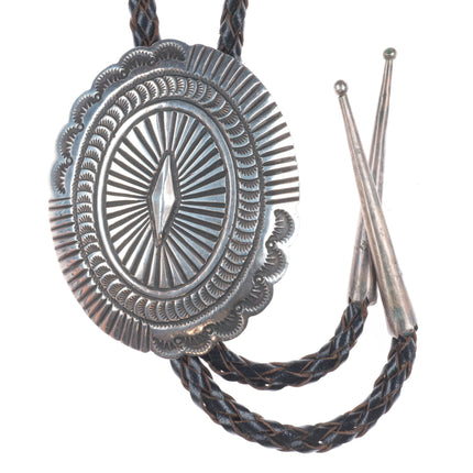 Big vintage Navajo sterling silver deep stamped concho style bolo tie