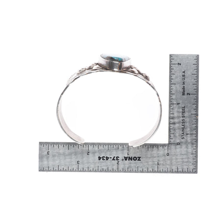 7" James McCabe Navajo sterling silver cuff bracelet w/ nice spiderweb turquoise