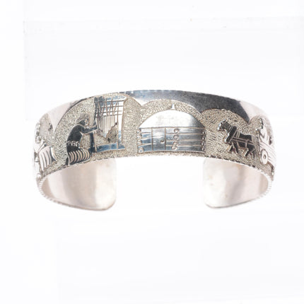 6.6" Richard L. Reeve Apache Native American sterling storyteller cuff bracelet