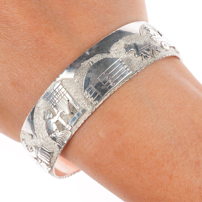 6.6" Richard L. Reeve Apache Native American sterling storyteller cuff bracelet