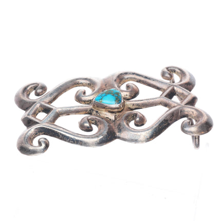 Vintage Navajo sterling silver, cast belt buckle with nice turquoise