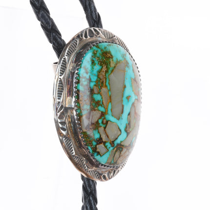 Vintage Herbert Tsosie Navajo sterling silver bolo tie with nice turquoise