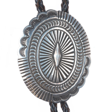 Big vintage Navajo sterling silver deep stamped concho style bolo tie