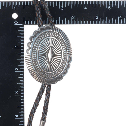 Big vintage Navajo sterling silver deep stamped concho style bolo tie