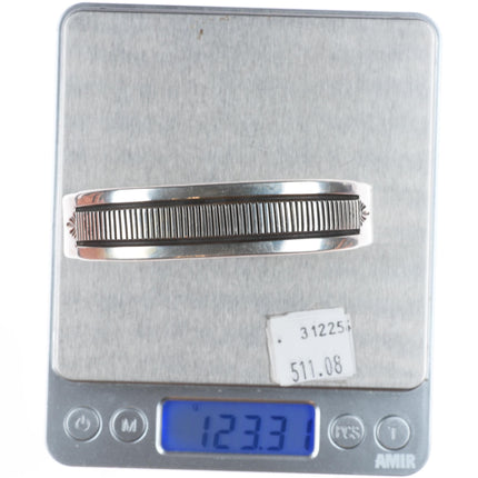 7.5" Heavy Bruce Morgan Navajo sterling silver interior stamped cuff bracelet