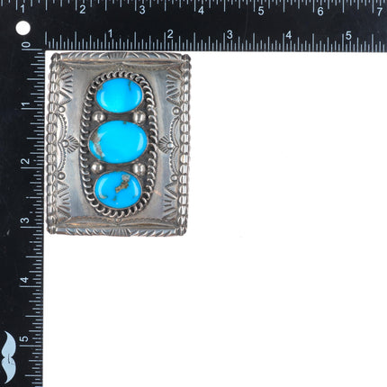 Vintage Navajo sterling silver deep stamped belt buckle with nice turquoise