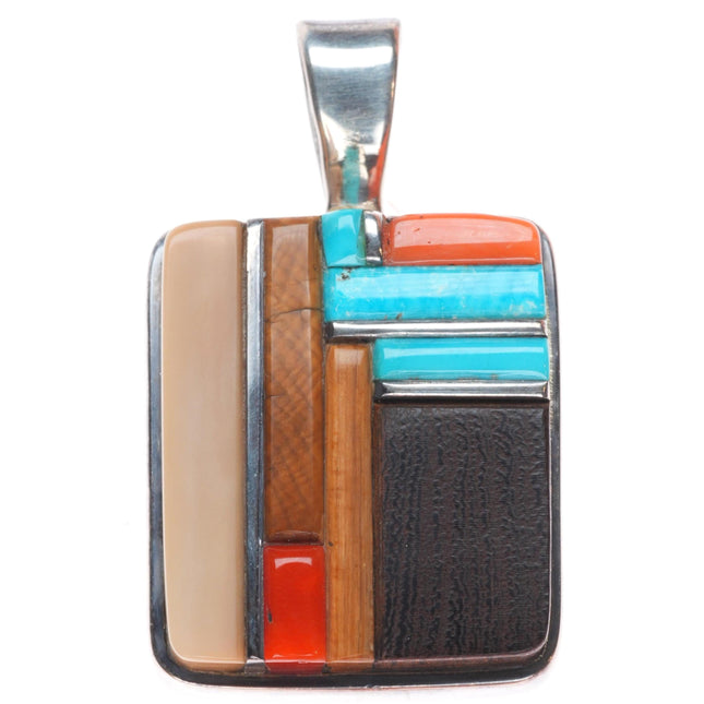 Sherian Honhongva Hopi turquoise, coral, fossil sterling silver corn row pendant