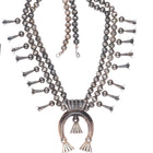 L Burnside Navajo vintage sterling silver stamped beads squash blossom necklace
