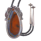 c1970 Big Ramon Native American sterling silver petrified Wood agate bolo tie