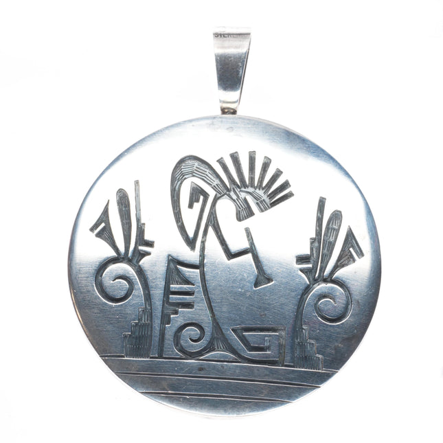Cheryl Wadsworth Hopi overlay spinner kokopelli/sunface pendant sterling silver