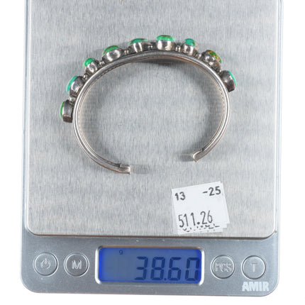 6.1" Carico Lake turquoise Nancy Custer Navajo sterling silver row cuff bracelet