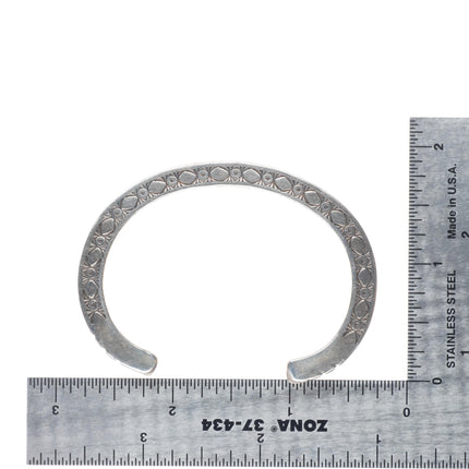 5.75" Raymond Twinhorse  San Felipe heavy stamped sterling silver cuff bracelet