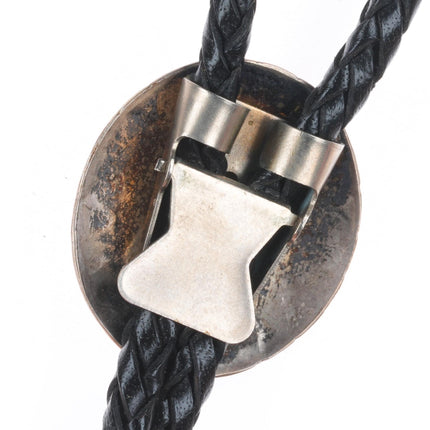 Vintage Navajo sterling silver bolo tie with stamped concho style slide