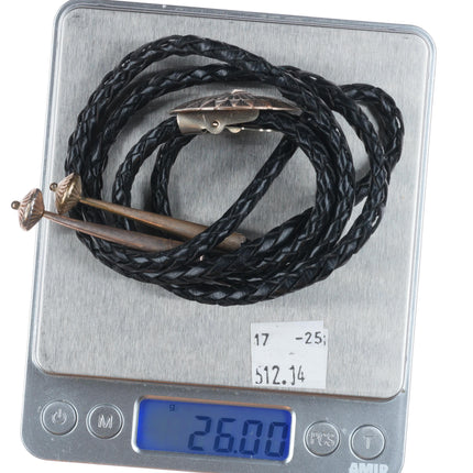 Vintage Navajo sterling silver bolo tie with stamped concho style slide