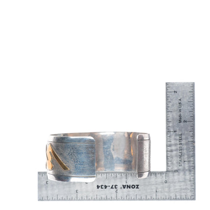 6.75" Thomas Navajo sterling silver, turquoise, brass mounted cuff bracelet