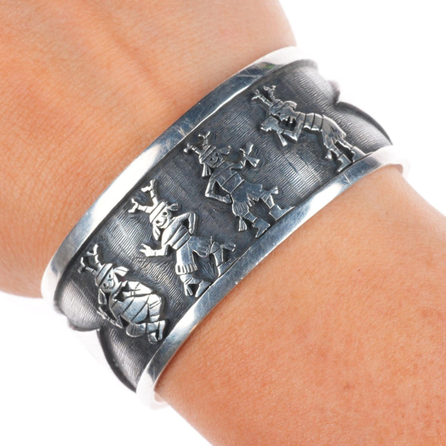 6.2" Ray & Dorothy Kyasyousie Hopi Overlay dancing kachinas cuff bracelet