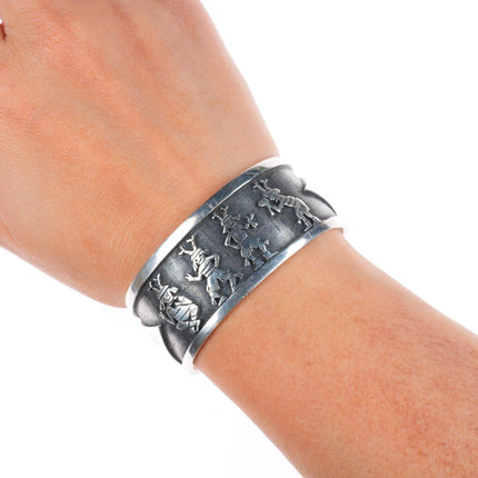6.2" Ray & Dorothy Kyasyousie Hopi Overlay dancing kachinas cuff bracelet