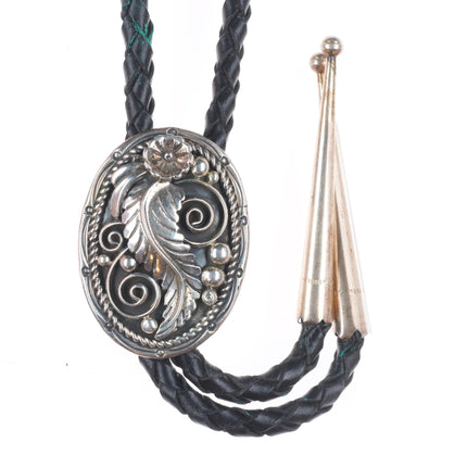 Vintage Sarah Curley Navajo sterling silver bolo tie with feather design