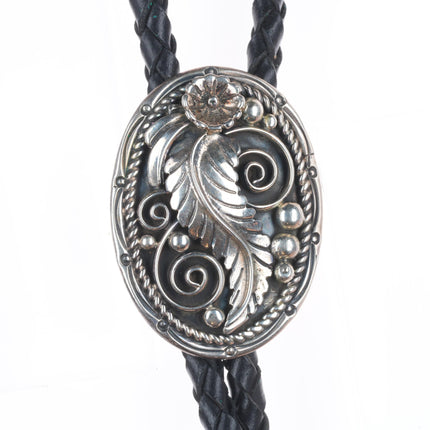 Vintage Sarah Curley Navajo sterling silver bolo tie with feather design
