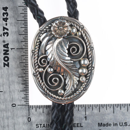 Vintage Sarah Curley Navajo sterling silver bolo tie with feather design