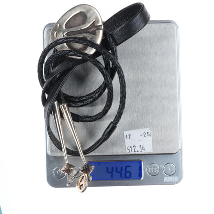 Vintage Navajo sterling silver bolo tie with dangly tips