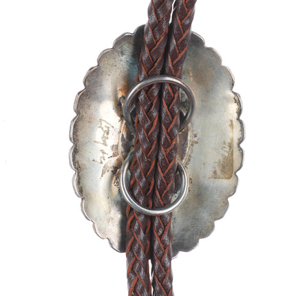Big Leroy Begay Navajo sterling silver Mediterranean coral chiseled bolo tie