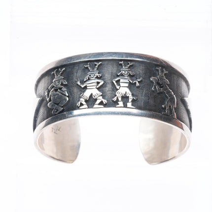 6.2" Ray & Dorothy Kyasyousie Hopi Overlay dancing kachinas cuff bracelet