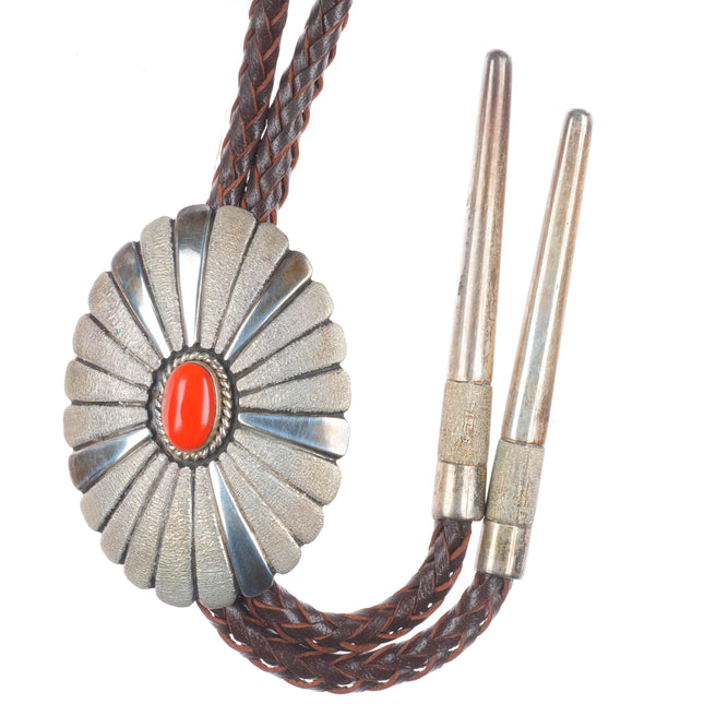 Big Leroy Begay Navajo sterling silver Mediterranean coral chiseled bolo tie