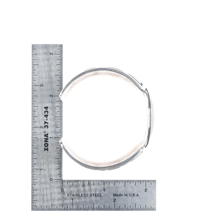 6.5" Harold Lomayaktewa Hopi overlay heavy sterling silver man in the maze cuff bracelet