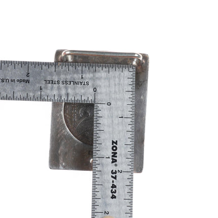 The Westerner Reno NV Sterling silver hand engraved dollar coin belt buckle