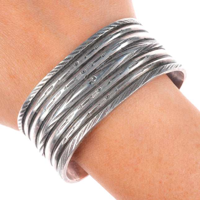 6.6" 1920's Antique Navajo ingot silver whirling logs/arrows stamp cuff bracelet
