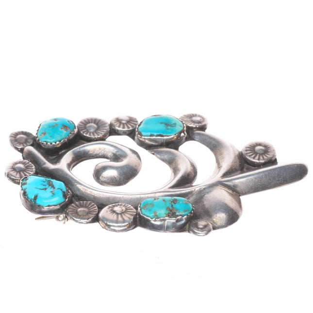 Vintage cast/stamped Zuni sterling silver pin with turquoise