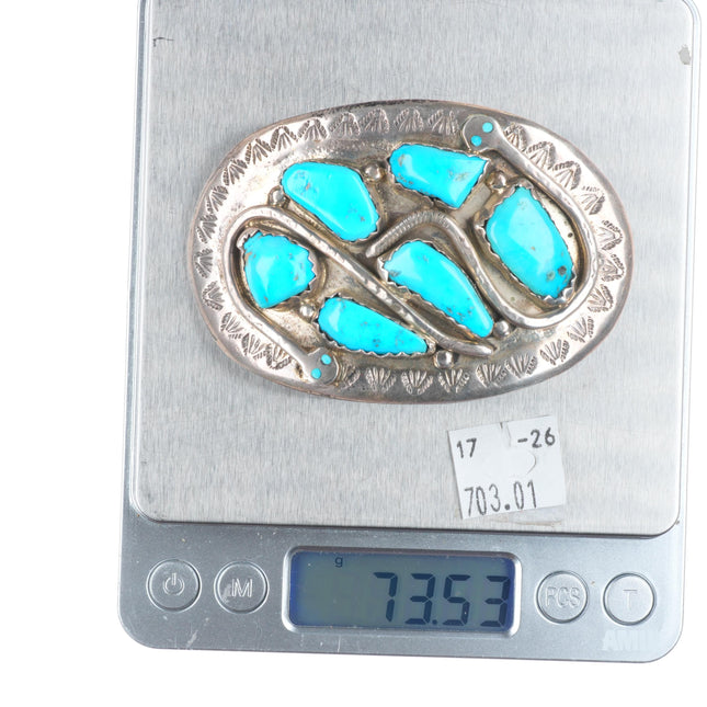Effie Calavaza Zuni sterling silver snakes belt buckle with turquoise nuggets