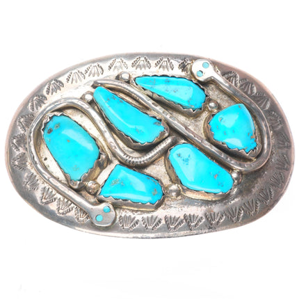 Effie Calavaza Zuni sterling silver snakes belt buckle with turquoise nuggets