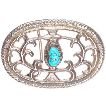 Vintage Navajo cast sterling silver belt buckle with turquoise