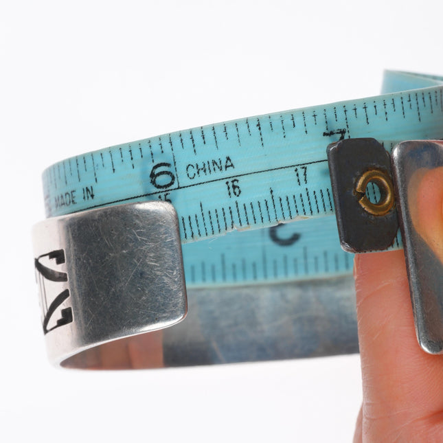 6.9" Bobby Secakuku Hopi overlay cuff bracelet sterling silver